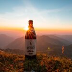 Produktbild eines Bieres zum Sonnenuntergang in den Allgäuer Alpen